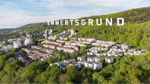 an aerial view of a city in the middle of a forest at Privatzimmer im 1 OG in einem Reihenhaus mit gemeinschaftlichen Zimmern in Heidelberg