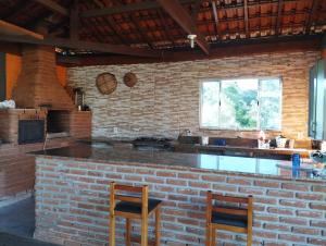 Kuchyň nebo kuchyňský kout v ubytování Chácara Lopes