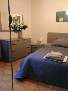 Postel nebo postele na pokoji v ubytování La Divina guest house