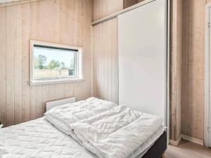 Postel nebo postele na pokoji v ubytování Luxury Lakeside Retreat - By Traum Ferienwohnungen