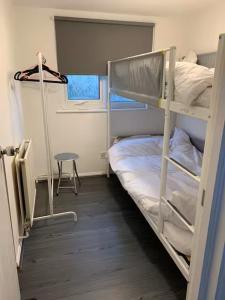 Postel nebo postele na pokoji v ubytování Byron View House