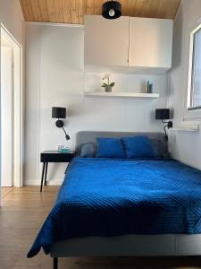 Voodi või voodid majutusasutuse Venice House — Domek przy plaży, sauna, jacuzzi toas