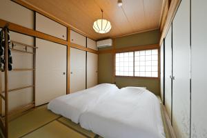 わとなみ客房内的一张或多张床位