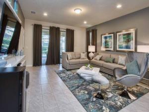 O zonă de relaxare la Gobi Gorgeous 6 Br Pool Game Rm Close to Disney