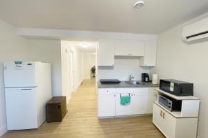 Η κουζίνα ή μικρή κουζίνα στο Luxury Airbn