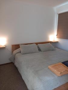 Katil atau katil-katil dalam bilik di Comfortable house per day, for 4 people