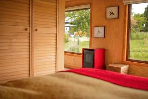 Postel nebo postele na pokoji v ubytování Casa Rayen