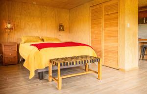 Postel nebo postele na pokoji v ubytování Casa Rayen