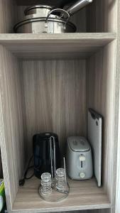 Kuchyň nebo kuchyňský kout v ubytování Cozy studio unit