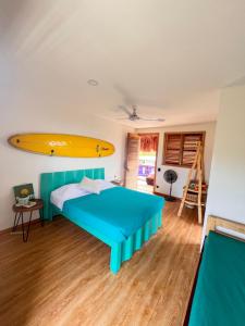 Postel nebo postele na pokoji v ubytování Habitación SURF en Mojarra Beach