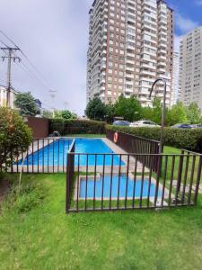 Bazén v ubytování Viña Plaza 1 nebo v jeho okolí