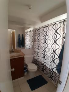 Koupelna v ubytování Viña Plaza 1