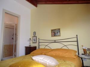 Postel nebo postele na pokoji v ubytování B&B Isonzo