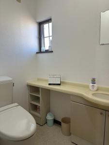 Koupelna v ubytování Kei Chia Private Lodging