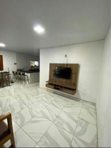 Μια τηλεόραση ή/και κέντρο ψυχαγωγίας στο Dila Beach House - Praia dos Algodões - Maraú +10 φωτογραφίες