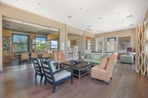 a living room with a table and chairs at Charming 2 bedroom Downtown Ft Worth in Fort Worth