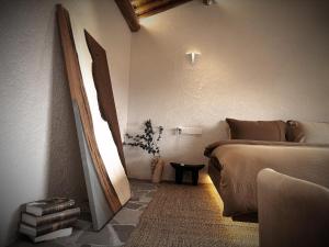 Resort in the valley of Zen 無名川禅意概念酒店客房内的一张或多张床位
