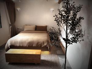 Resort in the valley of Zen 無名川禅意概念酒店客房内的一张或多张床位