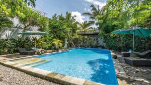 La alberca dentro o cerca de Gita Maha Ubud Hotel by Mahaputra-CHSE Certified