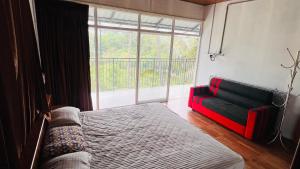 Katil atau katil-katil dalam bilik di Mayukham Farm House +6 gambar