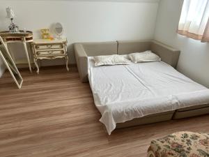 Voodi või voodid majutusasutuse ディアヘッド西一之江 toas
