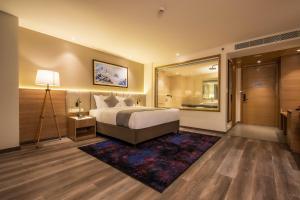 Postel nebo postele na pokoji v ubytování Best Western Plus Kathmandu