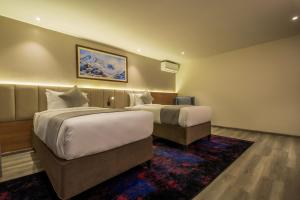 Postel nebo postele na pokoji v ubytování Best Western Plus Kathmandu