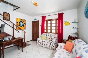 Coin salon dans l'établissement Casa Espaçosa próxima praia do Itapiruba