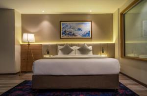 Postel nebo postele na pokoji v ubytování Best Western Plus Kathmandu