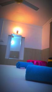 Postel nebo postele na pokoji v ubytování New Araliya Resort
