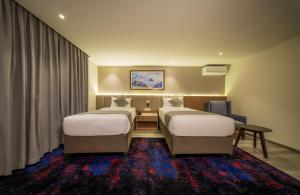 Postel nebo postele na pokoji v ubytování Best Western Plus Kathmandu