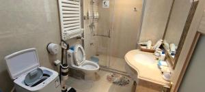 Et badeværelse på Tidewhisper Deluxe Suite 2 -2 Bedrooms, 2 Bathrooms