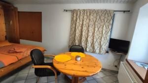 Krevet ili kreveti u jedinici u okviru objekta Charming studio in Poschiavo