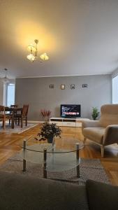 Posezení v ubytování 80 m2 moderne und zentrale Wohnung in Hannover mit eigenem Parkplatz + 28 fotografií