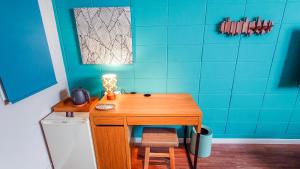 A kitchen or kitchenette at サンメール座間味アネックス