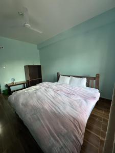 Postelja oz. postelje v sobi nastanitve Sauraha Guest House