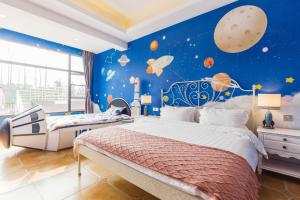 Postel nebo postele na pokoji v ubytování Hanju Guesthouse - Near Disney Park