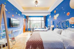 Postel nebo postele na pokoji v ubytování Hanju Guesthouse - Near Disney Park