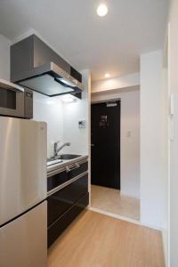 Kuchyň nebo kuchyňský kout v ubytování Hotel Emir