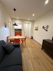 a living room with a couch and a table at Casa Vacanza Il Rifugio in Roccaraso