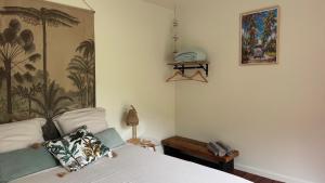 Postel nebo postele na pokoji v ubytování Bungalow l'escapade