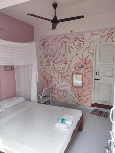 Postel nebo postele na pokoji v ubytování Vanam Pool Stay