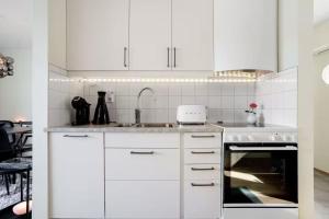 Nhà bếp/bếp nhỏ tại Comfortable Apartment with private dock