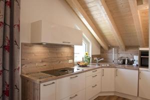 Una cocina o zona de cocina en Griass di