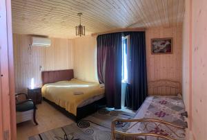 Voodi või voodid majutusasutuse Guest House Balda toas