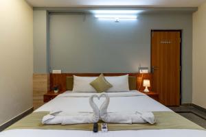 Hotel Chalet, Madiwala客房内的一张或多张床位