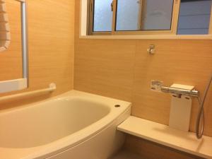 Koupelna v ubytování Tamaki Ryokan