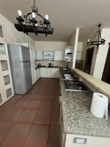 Kuchyň nebo kuchyňský kout v ubytování Peri Peri Etna Guest House