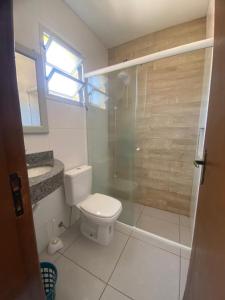 Ванная комната в Recanto do Leco - Praia da Armação