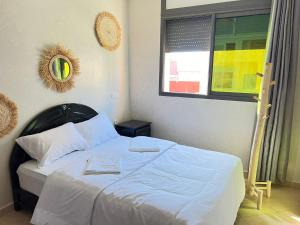 Letto o letti in una camera di Sun Set Surf House Imsouane